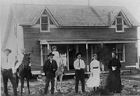  Speed Family in Clarendon, TX. From left to right, Ed Speed (son), Esther Speed (daughter on dark horse), Henry Lewis Speed (father), Bulah Speed (daughter on white horse), Charlie Speed (son), Mable Speed (daughter), and Lucy Florence Abbott Speed (mother).
