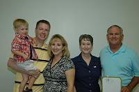  Right to left, Gerald and Wanda Parham with son, Aaron, and wife, Jennifer, with grandson, Connor.